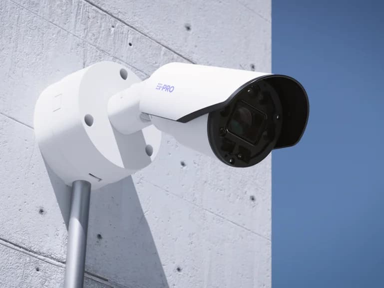 Technician auditing and upgrading commercial security control panels