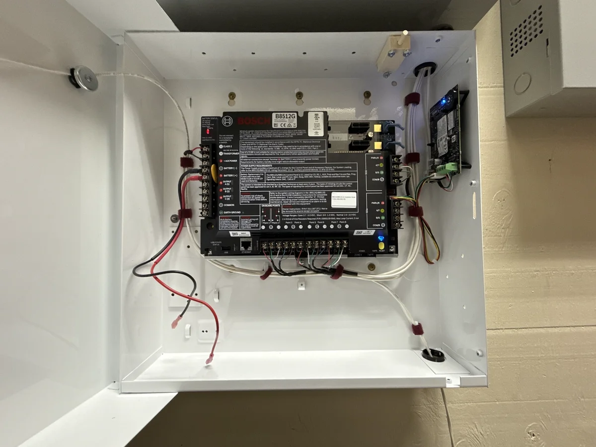 Bosch intrusion alarm panel with labeled zones and clean terminations